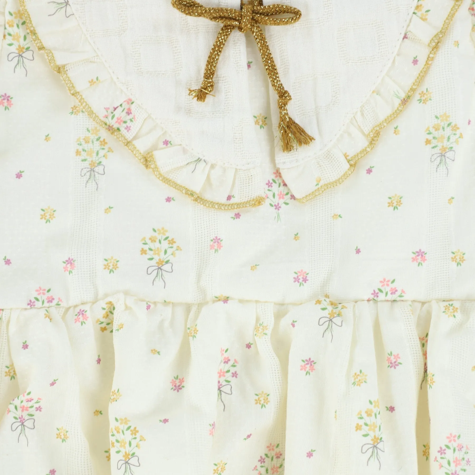 COSMOSOPHIE IVORY FLORAL RUFFLE COLLAR TIE ROMPER